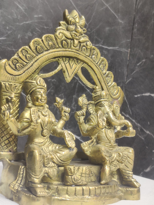 Sacred Duo: Ganesha & Lakshmi in One Frame